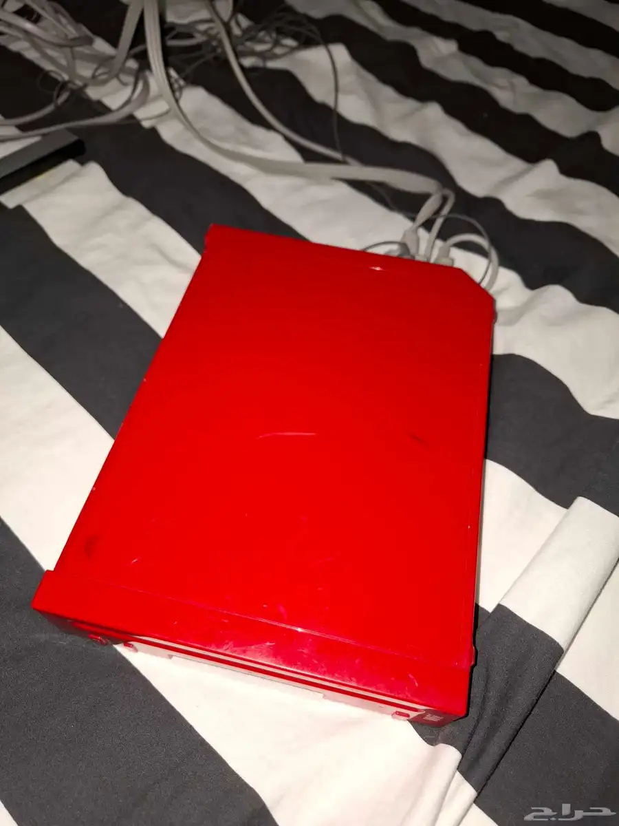 Used red Wii for sale (motion sensor  cables  controller) 1