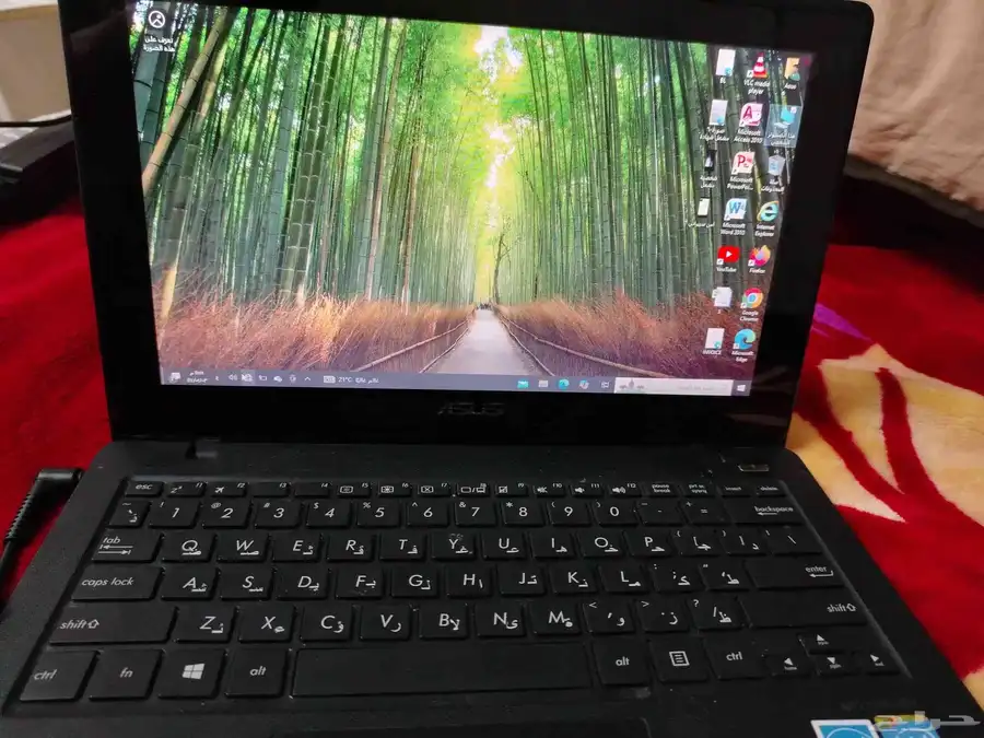 لاب توب اسود شركة asus اسيوس صغير شاشة لمس 4