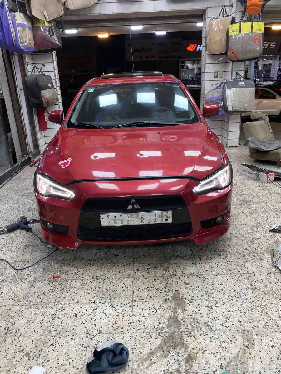 لانسر سبورت فل كامل بصمه فتحه سقف جير عادي رياضي index