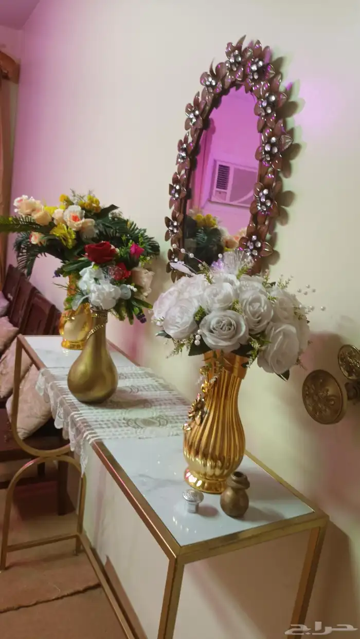 مدخل ذهبي مع مزهريات ورود 11