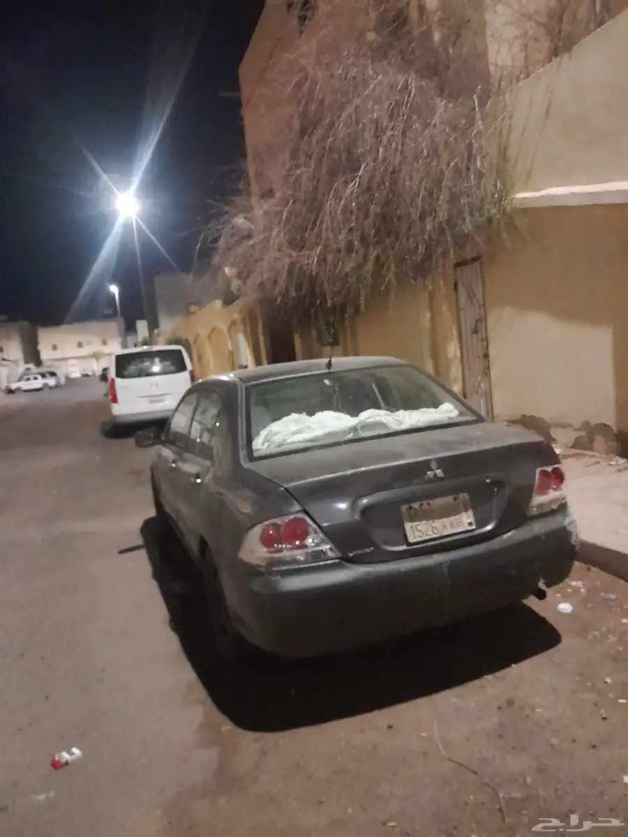 لانسر بومه نضيفه م شاءالله تباارك الله 7