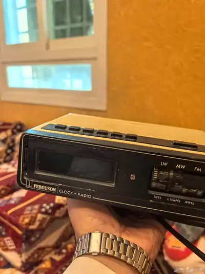 راديو قديم ومميز بساعة صناعة سنغافورة 9