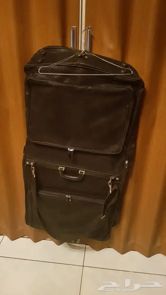 أغطيه شنطه لحفظ الملابس و البدلات 1