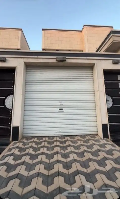 فني صيانة ابواب كراج القصيم 1