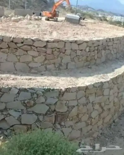 بناي حجر كبير وسواق بوكلين العنوان مكه 0