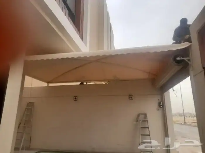 صيانة ابواب ومظلات 2