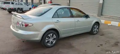 مازدا 2006. نظيفه مجدد مفحوص مكينه قير شرط 1