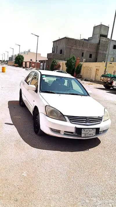 سيارة لانسر مكيفة للتوصيل بعنيزة وبريدة 1