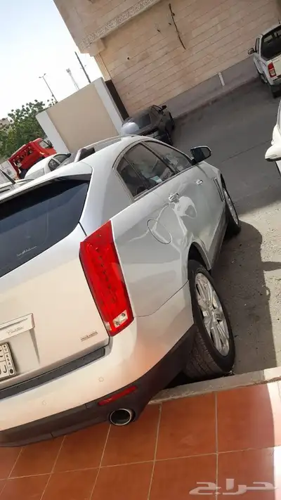 كادلاك 2013 فل كامل مفحوص ومجدد سياره ممتازه جدا 4