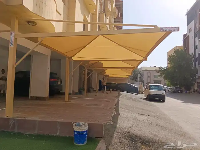 مظلات سيارات مظلات مواقف سيارات سواتر قماش 0