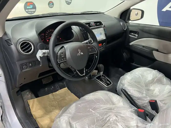 ميتسوبيشي اتراج GLX 2024 13