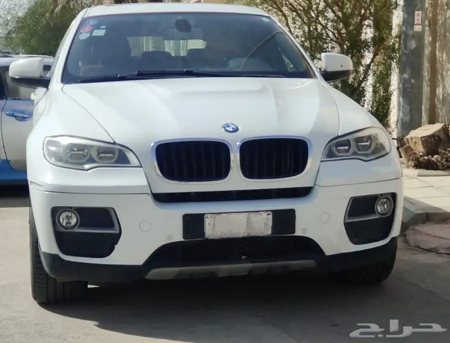 BMW X6 xDrive35i موديل 2014 - أبيض - فل كامل 3