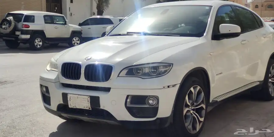BMW X6 xDrive35i موديل 2014 - أبيض - فل كامل 0