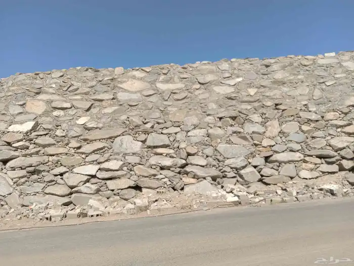 مقاول جدارات حجر وسواق بوكلين للحفريات 4