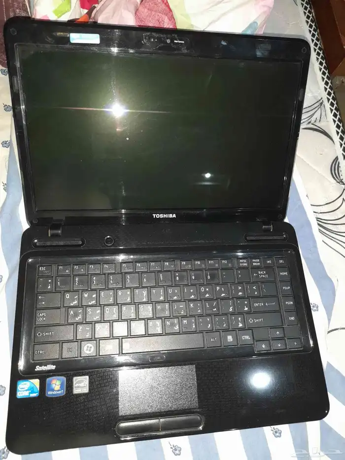 لاب توب توشيباشبه جديد شغال وندز 7 مع شاحنه 1