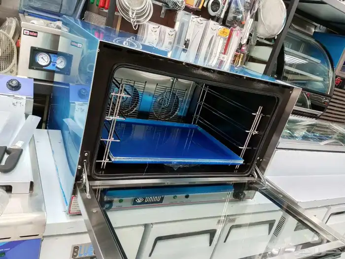 فرن هواي كونفكشن 4 صينيه ضمان سنتين 3