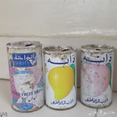 علب مشروبات دانه و الواحه تقريبا عمرها 31 سنه الشعار 0