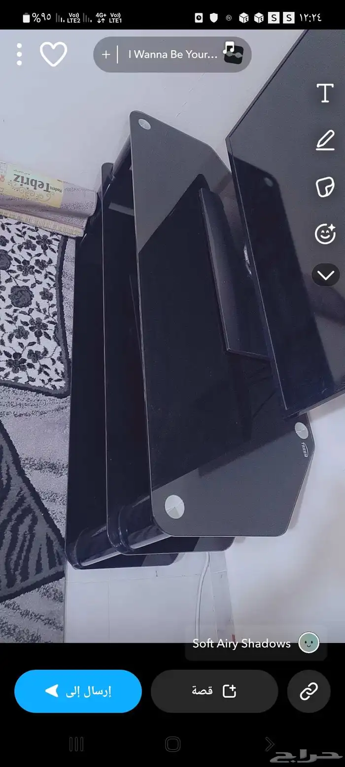 شاشه تلفاز مع طاوله تلفاز خاليه من العيوب لأعلى سعر 1