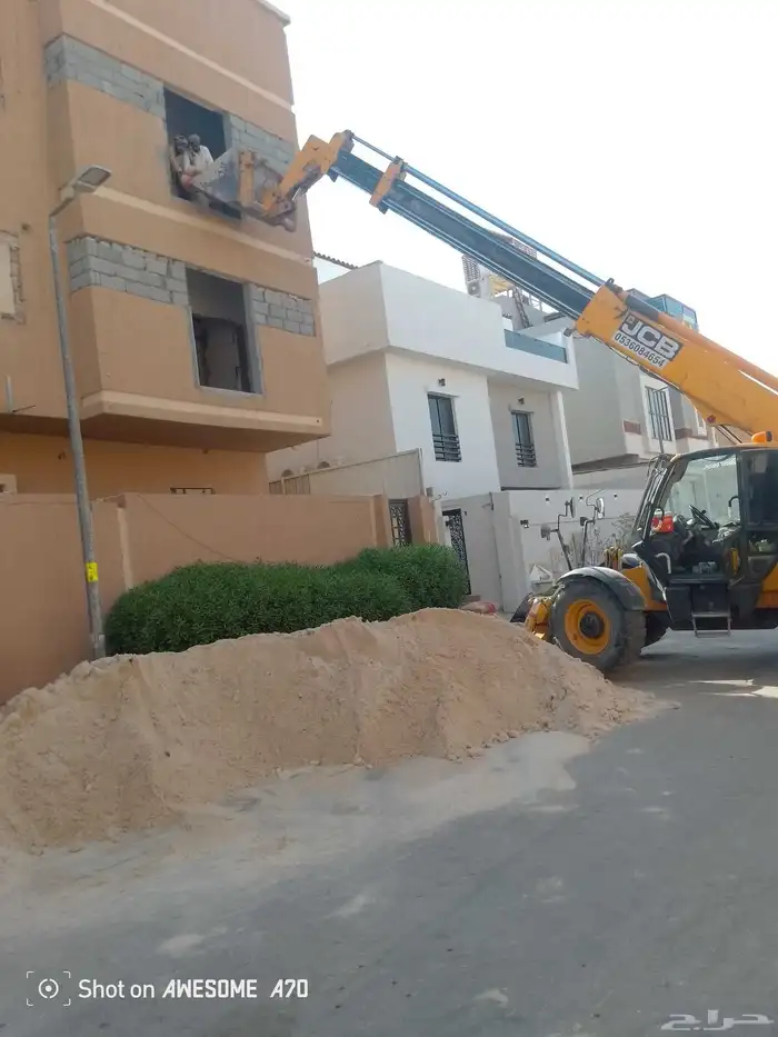 رفعه جي سي بي بوم لرفع جميع مواد البناء 4