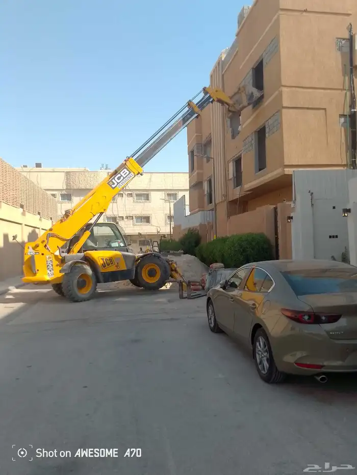 رفعه جي سي بي بوم لرفع جميع مواد البناء 2