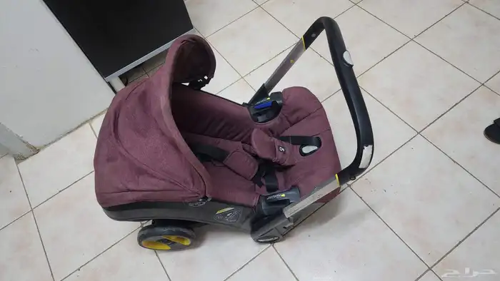 عربية اطفال وكارسيت _ سترولر ماركة doona 7