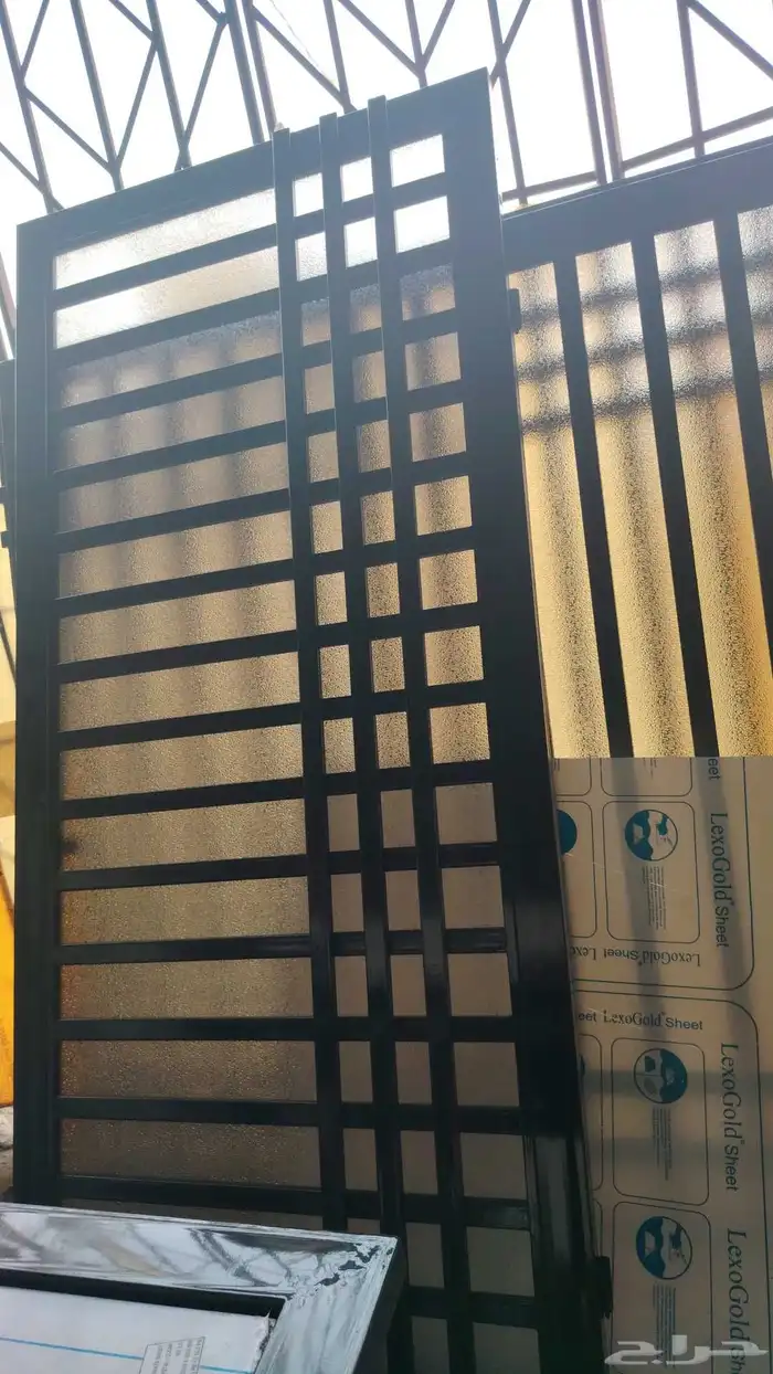 أبواب حديد وأبواب خشب وأبواب المنيوم وأبواب سحاب جلدو هناجر 1