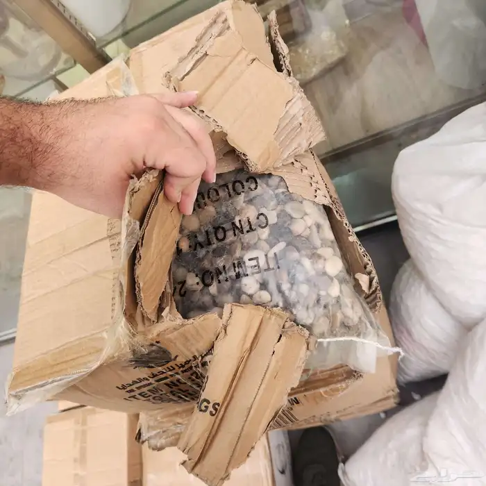 حجارة حصى حبوب اكياس لون ابيض و بني 2