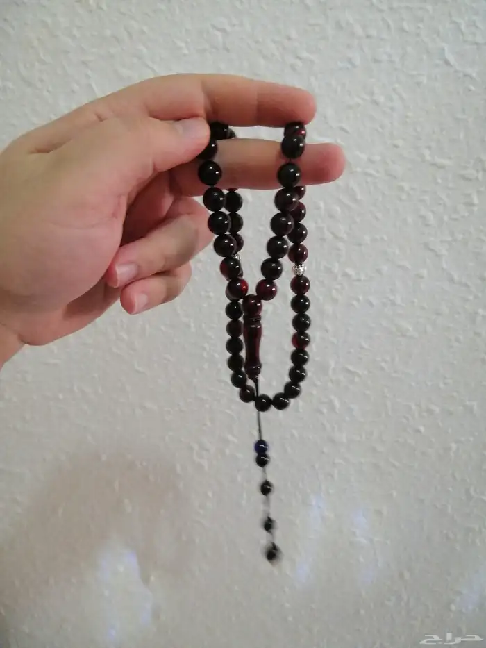 سبحة كهرمان لون عنابي صافية (جديدة). 1