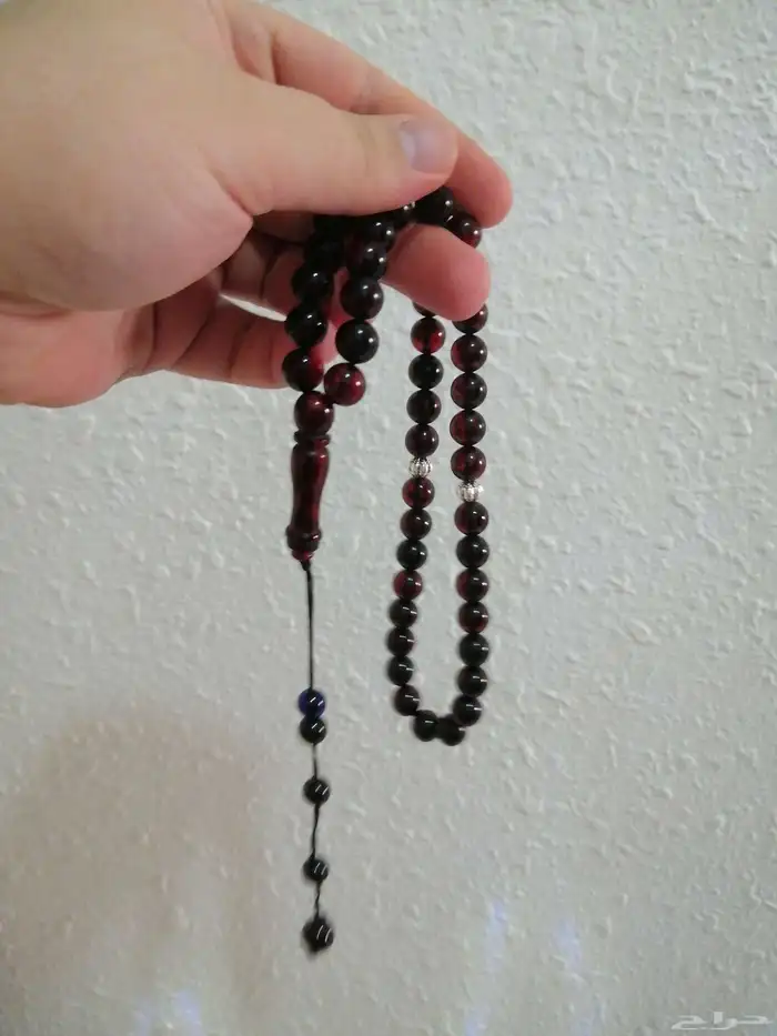 سبحة كهرمان لون عنابي صافية (جديدة). 0