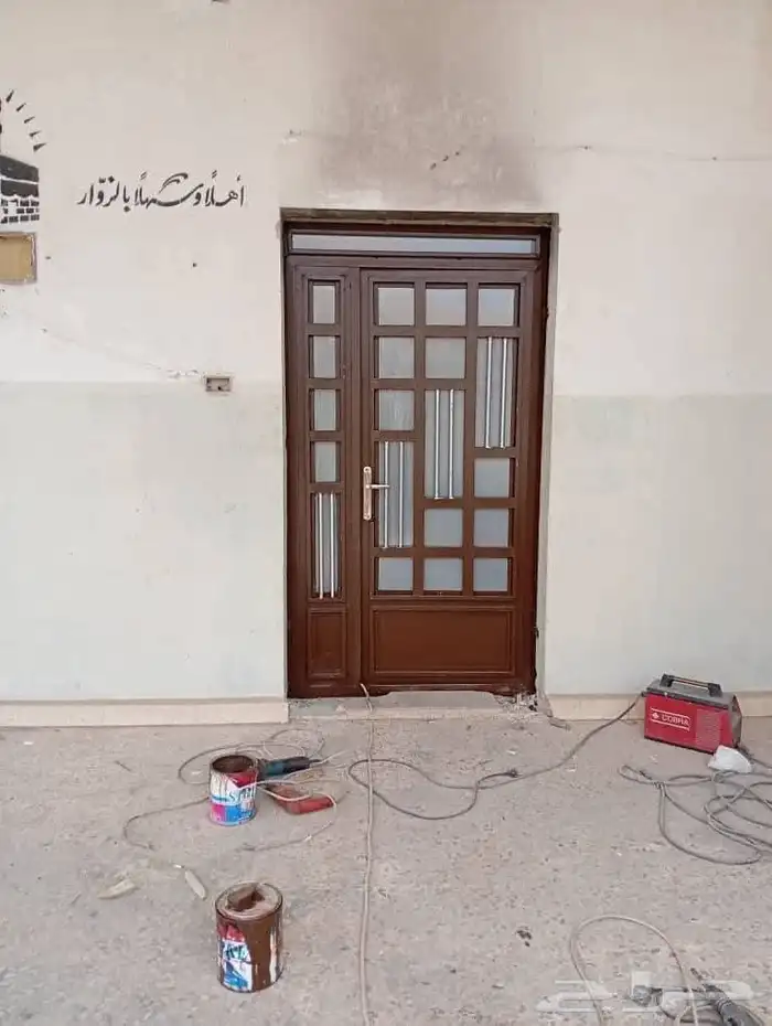 أبواب حديد وأبواب خشب وأبواب المنيوم وأبواب سحاب جلدو هناجر 8