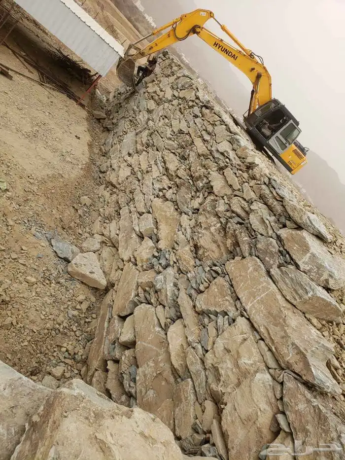 بناء جدار ات الحجر قص اراضي نقل ردميات 1
