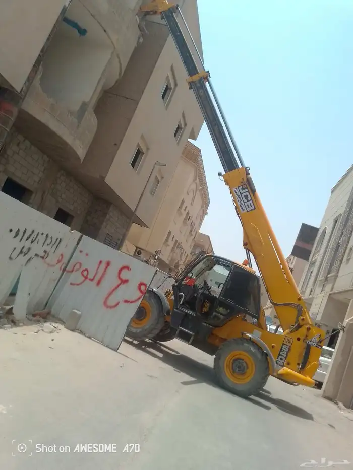 رافعه جي سي بي بوم لرفع جميع مواد البناء يوميه وشهري وشغله 0