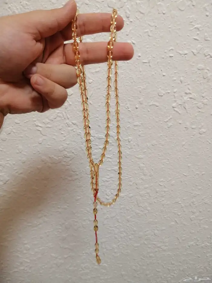 سبحة كهرمان حشري لون شفاف (جديدة). 1