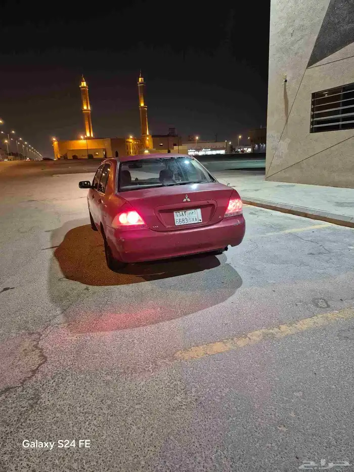 سيارة ميتسوبيشي لانسر 2006 4