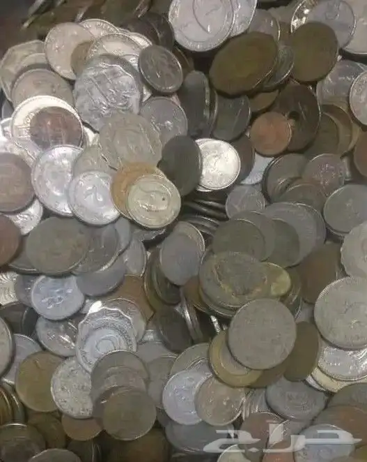 عملات معدنيه وصدام حسين 0