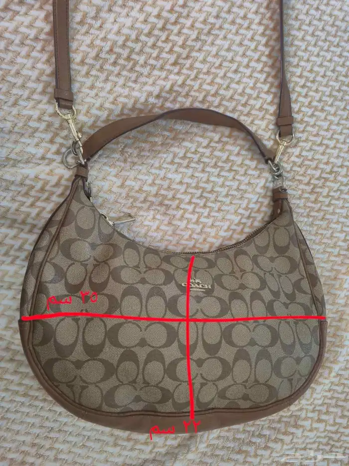 شنطه كوتش الاصليه تم الشراء من المتجر الاصلي في امريكا 0