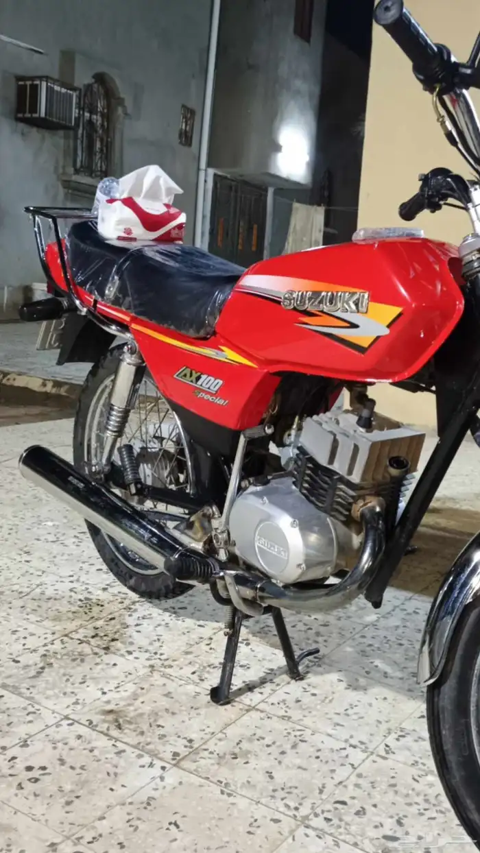 دباب سوزوكي اصلي AX100 بالوحه 1