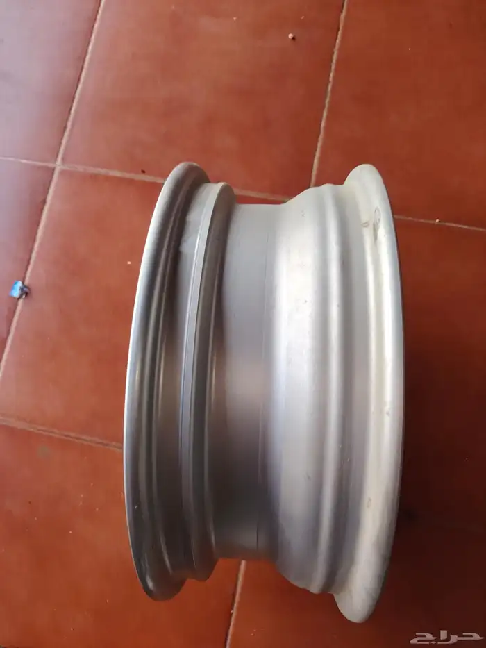 جنوط نيسان صني اصليه مقاس 15 4