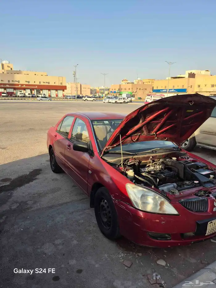 سيارة ميتسوبيشي لانسر 2006 13