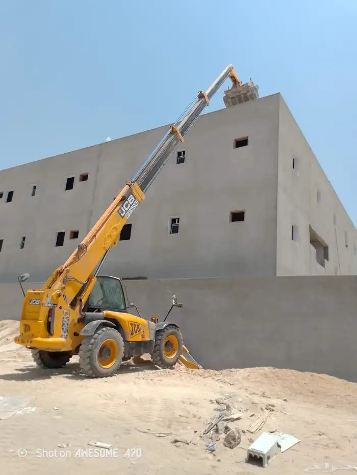 رفعه جي سي بي بوم لرفع جميع مواد البناء 2