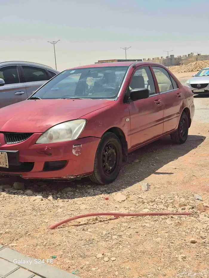 سيارة ميتسوبيشي لانسر 2006 15