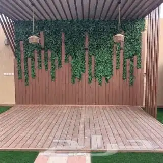 تكسيات جدارية ديكورات العشب الصناعي 1