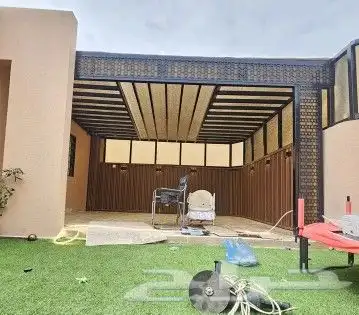 حداد مظلات شينكو قماش ساندويش بنل هناقر برجولاات شريح سواتر 1