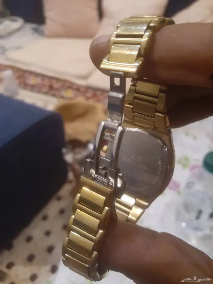 ساعه سويسرية مطليه ذهب ومرصعه الماس ... جينوفوكسي ... 2