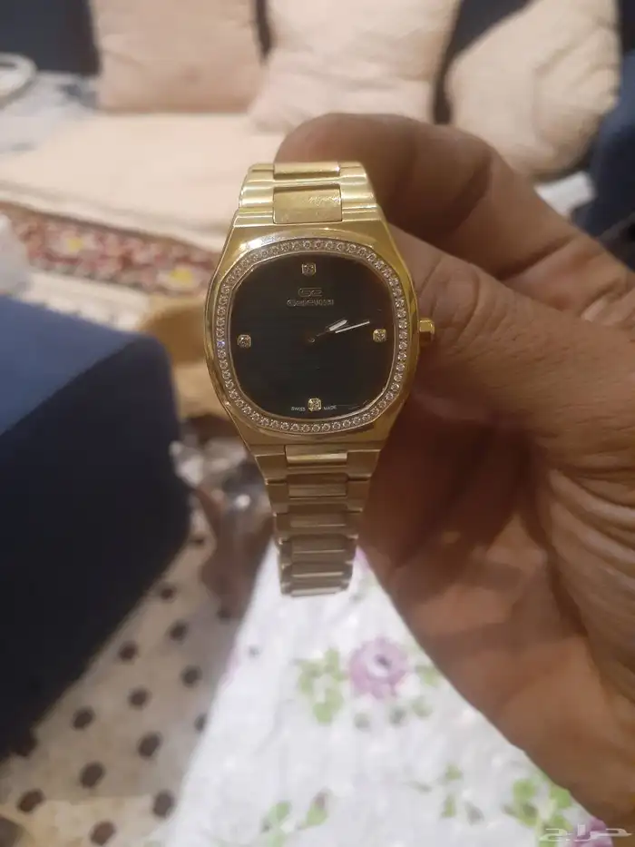 ساعه سويسرية مطليه ذهب ومرصعه الماس ... جينوفوكسي ... 0