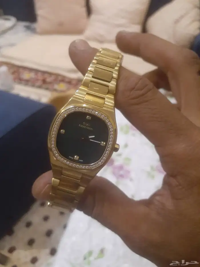 ساعه سويسرية مطليه ذهب ومرصعه الماس ... جينوفوكسي ... 1