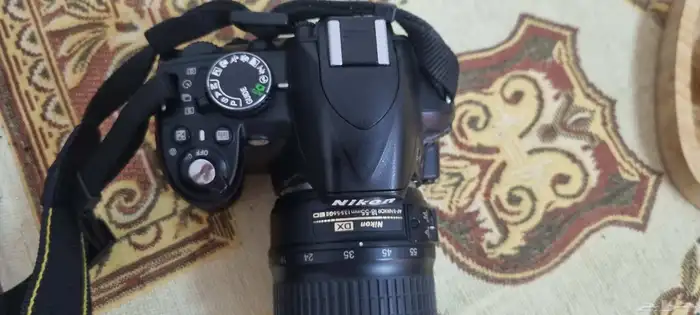للبيع الكاميرا نيكون D3100 معاها أغراضها كاملة 4
