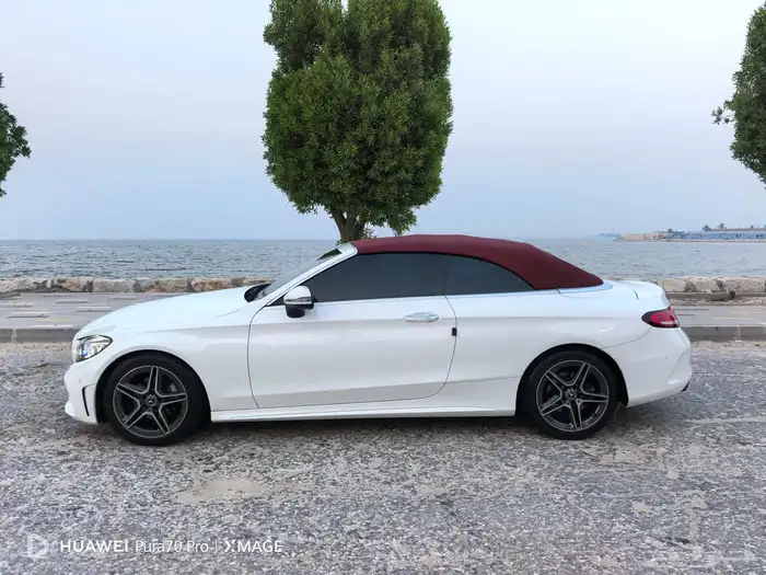 للبيع مرسيدس 2021 كشف احمر C200بحالة الوكاله 1