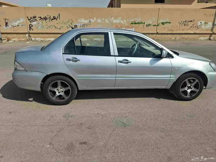 سياره مستبيشي لانسر 2011 استماره ساريه السعر8000 0