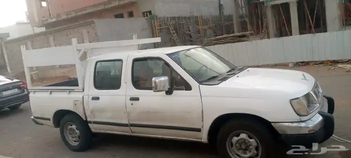 نيسان وينيت غمارتين نظيف و مكيف شغال وقير المكينه علي الشرط 1